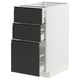 Modern white cabinet with three matte black drawers featuring sleek, integrated handles.