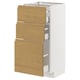 White METOD kitchen unit with three oak-effect drawers. Modern, minimalist design with integrated handles.