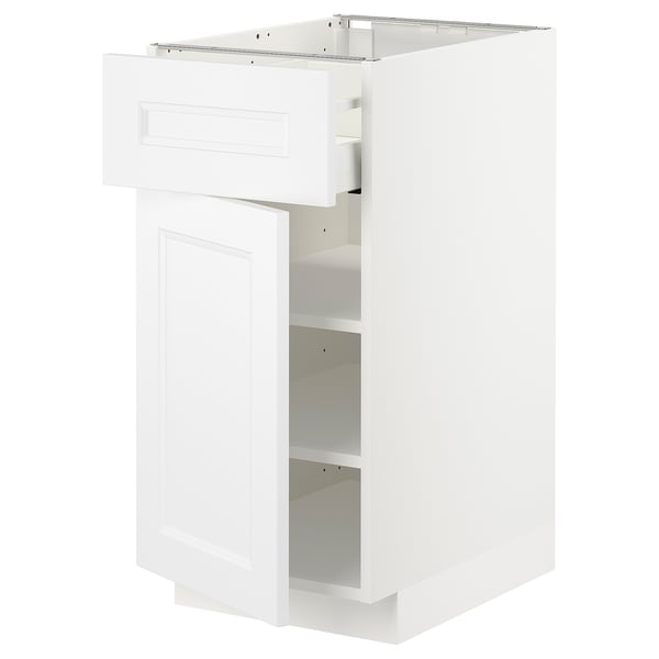 A white METOD kitchen cabinet with a drawer and shelf, modern and traditional design, smooth finish.