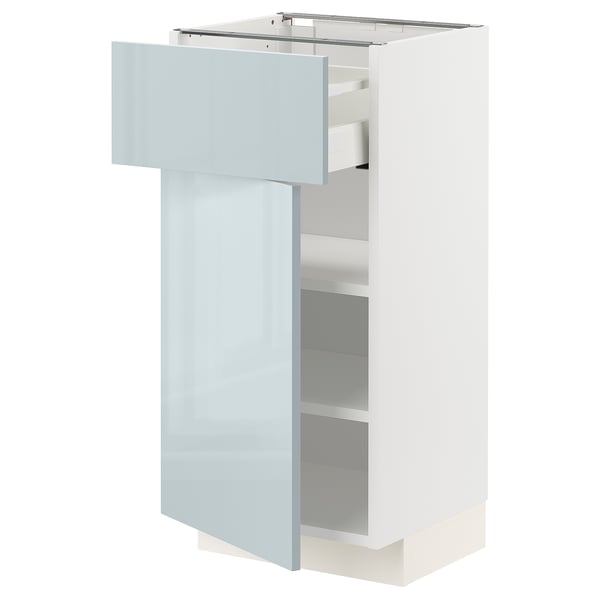 White kitchen cabinet with blue-grey glossy doors, adjustable shelves, and metallic handles.