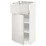 Modern white kitchen cabinet with glossy finish, single open door, adjustable shelves, sleek design.
