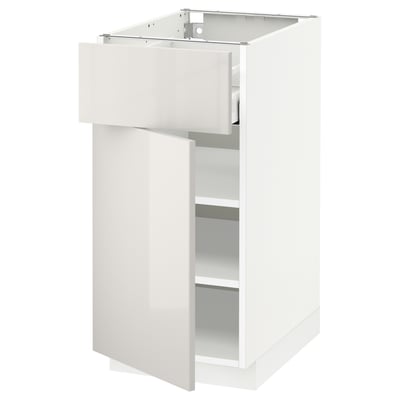 White high-gloss kitchen cabinet with a single drawer and door, sleek and modern design.