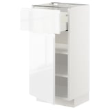 White METOD kitchen cabinet with high gloss finish, sleek modern design.