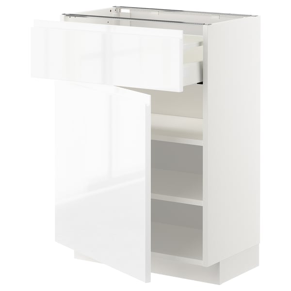 White METOD kitchen cabinet with pull-out drawer and adjustable shelves.