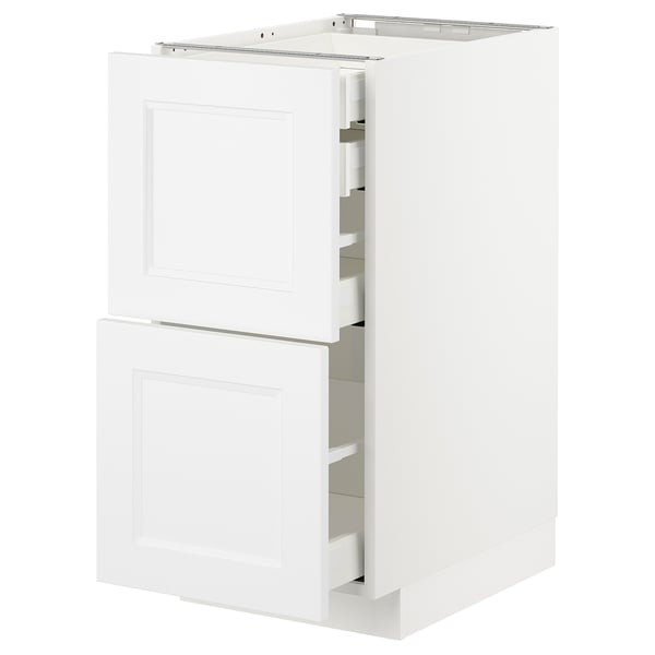 A white METOD kitchen cabinet with two drawers and a door. It a sleek, modern design with smooth surfaces and clean lines.