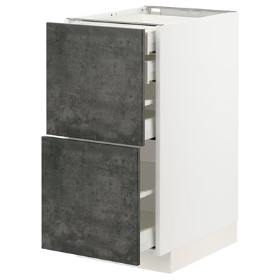Modern white kitchen cabinet with dark grey drawers, sleek design, sturdy construction.