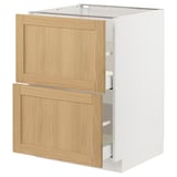 An ikea METOD kitchen cabinet with white and oak veneer drawers.