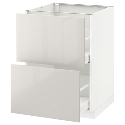 METOD white kitchen cabinet with glossy drawer and door.