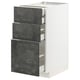 Modern kitchen cabinets with dark grey drawers, sleek METOD design.