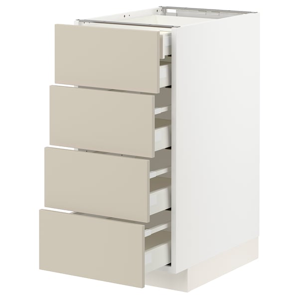 METOD kitchen unit with beige drawers, white cabinet, four full-extension drawers.