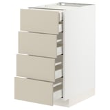 METOD kitchen unit with beige drawers, white cabinet, four full-extension drawers.