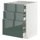 A modern kitchen cabinet with three gray-green glossy drawers and a white top.