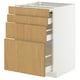 White METOD kitchen cabinet with oak drawers and silver handles.