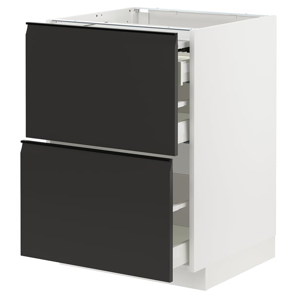 Modern kitchen cabinet: white METOD with black upplöv drawers, sleek design, semi-open for visibility.