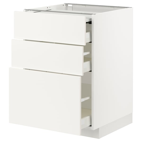 This image shows a white METOD kitchen unit with smooth, modern design featuring multiple drawers and a pull-out work surface.