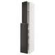 Modern kitchen unit: METOD with black upplöv doors, sleek handles, and white frame, tall and rectangular, 25-year guarantee.