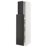 A modern black and white METOD kitchen unit with integrated handles and sleek design.