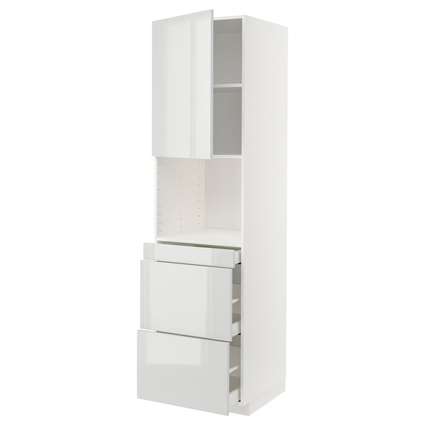 Modern white kitchen unit with high gloss finish, featuring drawers and shelves, part of ikeas METOD line.