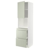 METOD kitchen unit in green with light wood effect drawers and cabinets. Modern, sleek design with soft-closing drawers.