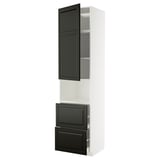 Modern white kitchen cabinet with black doors, multiple shelves and drawers.