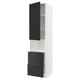 A white METOD kitchen cabinet with black nickebo fronts, featuring drawers and shelves, modern and sleek.