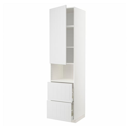 White kitchen cabinet with two open drawers and one open door, showing shelves inside.