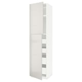 White high gloss METOD kitchen cabinet with shelves.