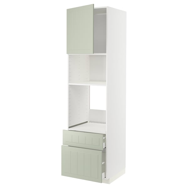 A METOD kitchen unit with green stensund fronts, featuring cabinets and a drawer in a white and green color scheme.