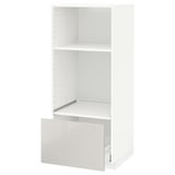 A white METOD kitchen cabinet with an open drawer and shelf.