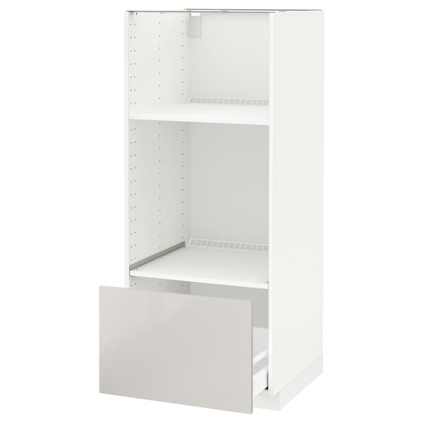 METOD white kitchen cabinet with glossy drawer.