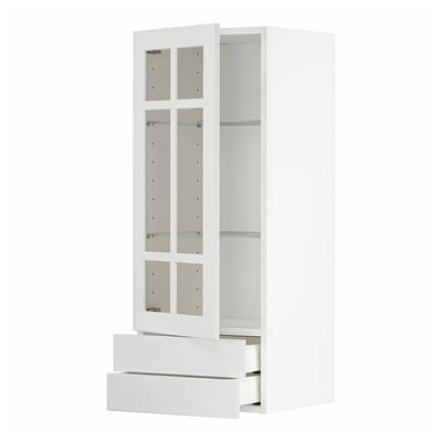 White METOD kitchen cabinet with glass doors and drawers.