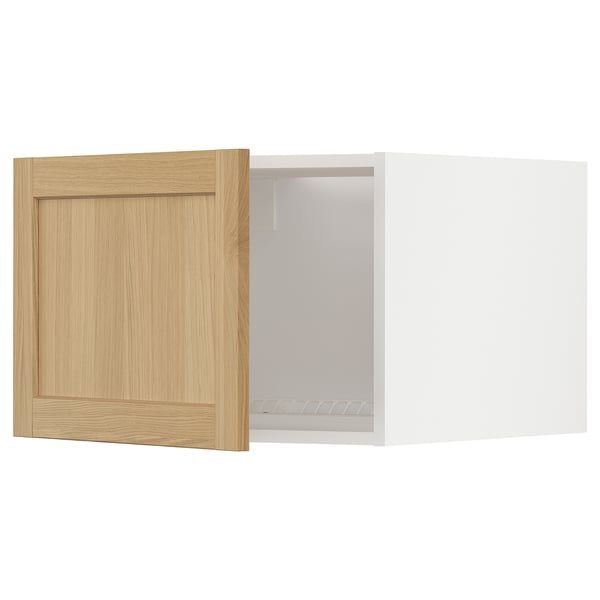 Wooden METOD cabinet with light oak door and adjustable shelves.