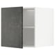 Dark grey concrete effect kitchen cabinet with adjustable shelf.