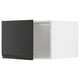 Modern black kitchen cabinet with sleek design and integrated handles.