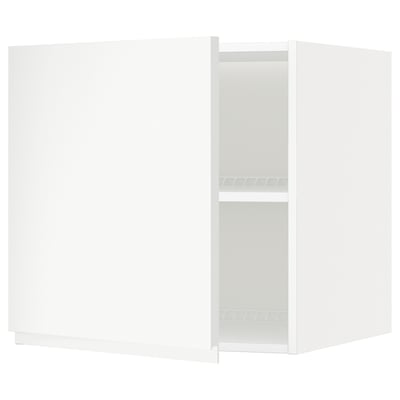 A white METOD kitchen cabinet with a minimalist design and adjustable shelves.