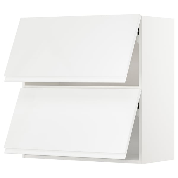 A white ikea METOD kitchen cabinet with two doors and handles.