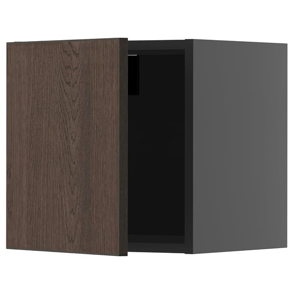 Modern dark brown oak cabinet, square shape, with one open door.