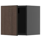 Modern dark brown oak cabinet, square shape, with one open door.