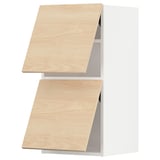 Two light wooden kitchen cabinets with open doors, featuring light ash finish and silver handles.