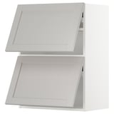 A white METOD kitchen cabinet system with light grey lerhyttan fronts, featuring bevelled edges and a classic, traditional design.