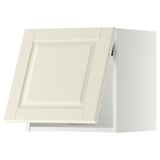 A white kitchen cabinet from the METOD system with beveled edges and a door lift mechanism.