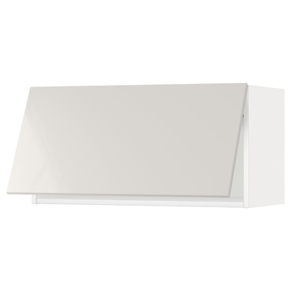 A modern white kitchen cabinet with a sleek design.