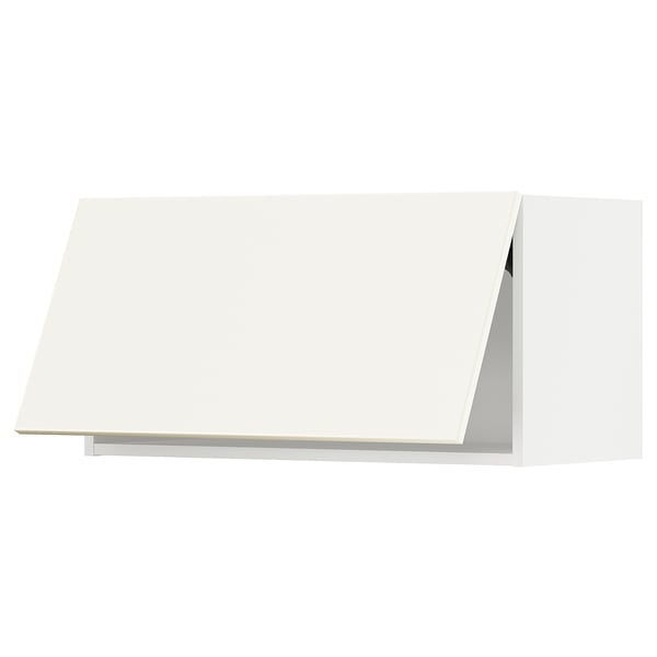 A white kitchen cabinet from the METOD system. Its rectangular, with a flat top and a modern design.