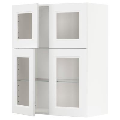 White METOD kitchen cabinet with glass doors and shelves.