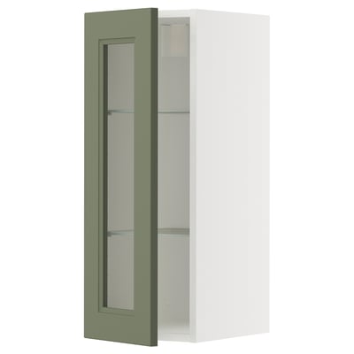 Ikea METOD kitchen cabinet with green-gray glass door, wall-mounted.