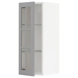Open grey METOD kitchen cabinet with glass doors showcasing a modern design.
