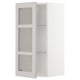 White wall cabinet with glass shelves. Modern design, adjustable shelves, sturdy frame.