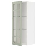 METOD wall cabinet with green glass door, shaped square with adjustable shelf.