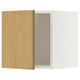 A white and light wooden METOD wall cabinet with one door slightly open, revealing glass shelves inside.