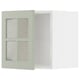 METOD green wall cabinet with glass doors.